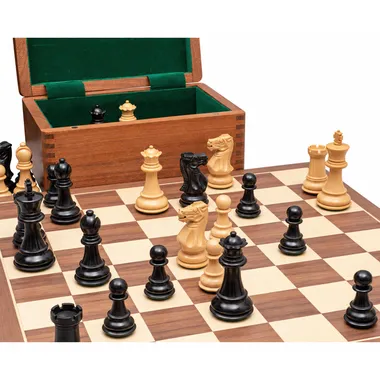 Open rosewood box lined with green felt, pieces set out on the board