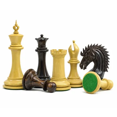 Sheffield chess set in rosewood, pieces lying down showing green felt base