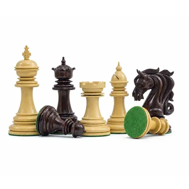 Chess pieces «Porte du Roi» standing and lying showing the felted base