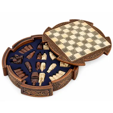 Open box showing the round board and resin pieces stored inside