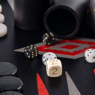 Backgammon set in black and silver oak wood, dice and cup on the board