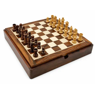 Overall view of the wooden chess set with light and dark pieces in starting position