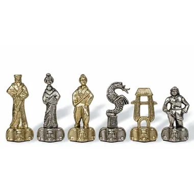 Samurai metal chess pieces in gold and silver, dragon and figures