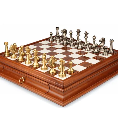 Staunton pieces in gold and silver brass arranged on the Tuscan alabaster chess board