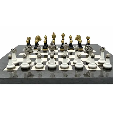 Staunton Design III chess pieces lined up, white row in the foreground