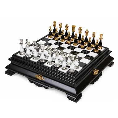 Complete chess set with black and white board, gold and silver pieces