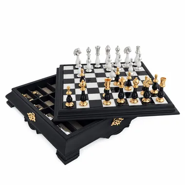 Open chess board showing interior storage for black and gold pieces