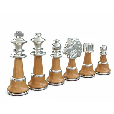 Chess pieces in wood and silver-plated brass, complete set lined up