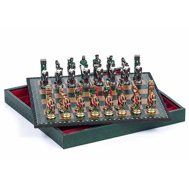 Open box showing the chess board and painted pieces with red lining