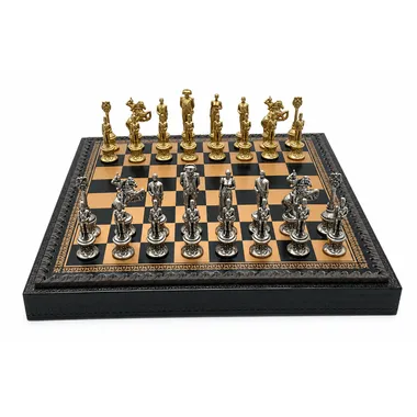 Complete Napoleon chess set with gold and silver pieces on faux leather board