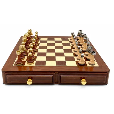 Wooden chess board with gold and silver pieces in opening formation