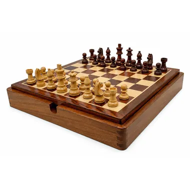 Open wooden box with chess pieces arranged, side view