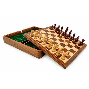 Magnetic travel chess set open, wooden pieces arranged on the board