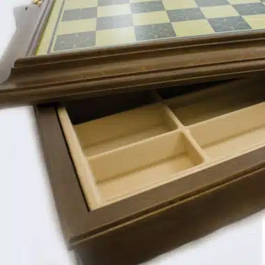 Wooden chess board, detail of the open internal storage compartment