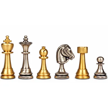 Solid brass Staunton chess set, matching gold and silver tone pieces