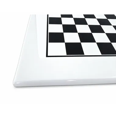 Large chessboard in white lacquered wood, close-up of the corner and frame