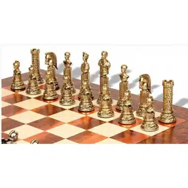 Gold-tone Roman Empire VIII chess pieces lined up on the wooden chessboard