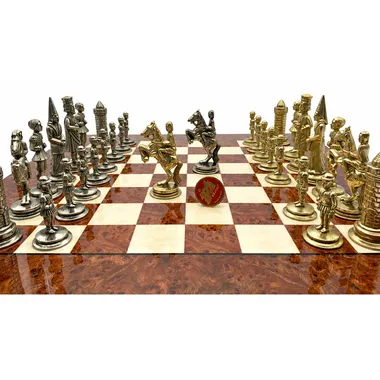 Gold and silver knights facing each other at the centre of the board