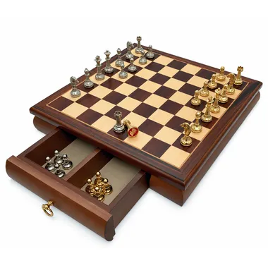 Open drawer showing the gold and silver pieces stored in their compartment