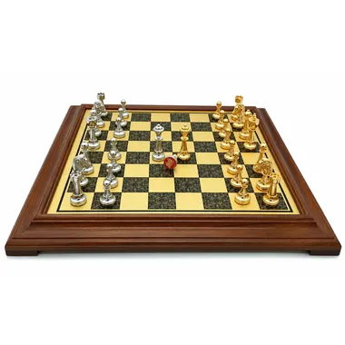 Game position with gold and silver pieces on the wooden chess board