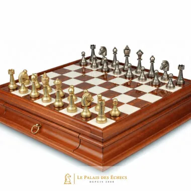 Marble chess board with gold and silver-tone metal pieces in opening position