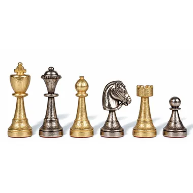 Chess pieces in gold and silver metal, close-up of knight and rook