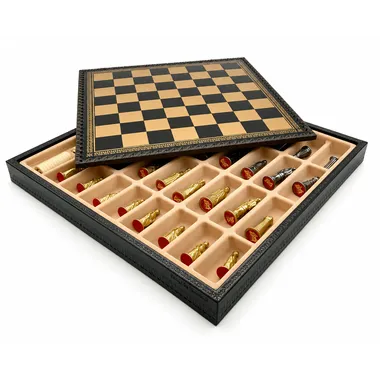 Open storage box showing interior compartments for the solid metal chess pieces