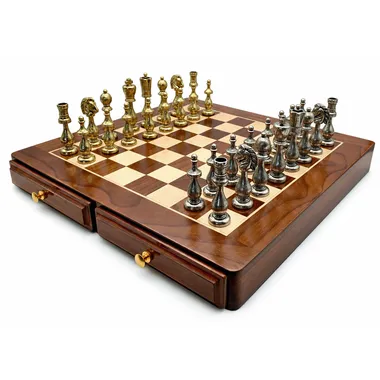 Overall view of the chess board with gold and silver metal pieces set up for play