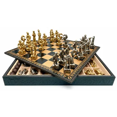 Samourai II pieces in gold and silver metal lined up on the board with open box