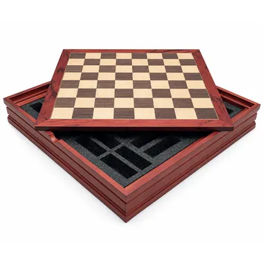 Chess board open showing the padded internal storage compartment