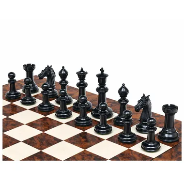 Black pieces in solid ebony wood lined up on the board, detailed view