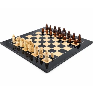 Complete Isle of Lewis chess set on black lacquered board with light wood squares