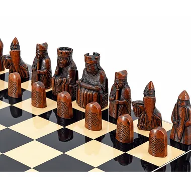 Close-up of Isle of Lewis resin chess pieces, king and rooks on the board