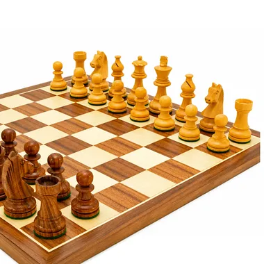 Close-up of rosewood pieces lined up on the walnut and maple chess board