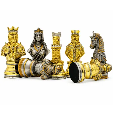 Detail of gold and silver pieces, king, queen, rook and knight