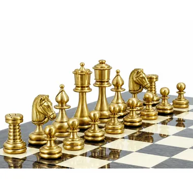 Gold brass chess pieces, detail of the gold side of the Perse II set