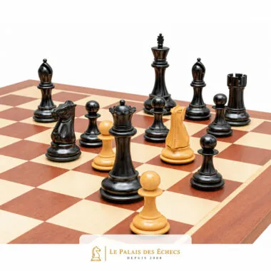 Close-up of black Abbaye pieces, king, queens and knights facing white pawns