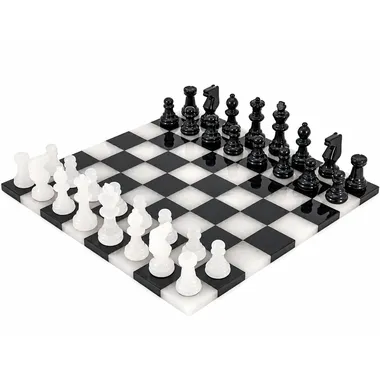 Complete chess set in black and white marble, pieces and board from the front