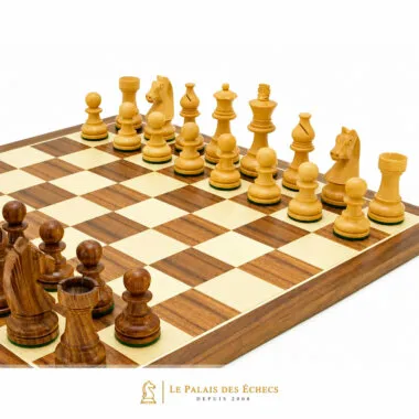 Rosewood pieces lined up at an angle on the walnut and maple chess board