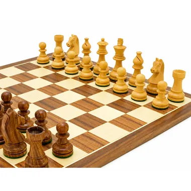 Rosewood pieces lined up at an angle on the walnut and maple chess board