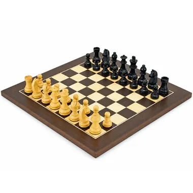 Complete chess set arranged on the wenge and maple board, general view