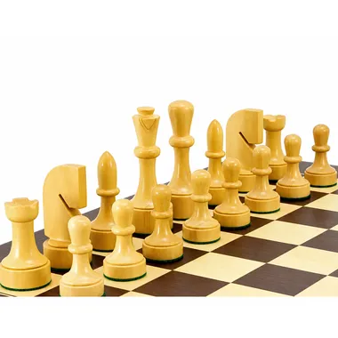 Natural boxwood chess pieces shown in profile on the board