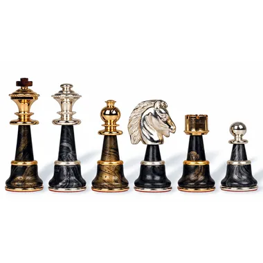 Pieces lined up, king, rook, knight and pawn in solid brass