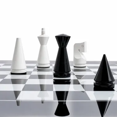 Modern cone-shaped black and white pieces lined up on the lacquered board