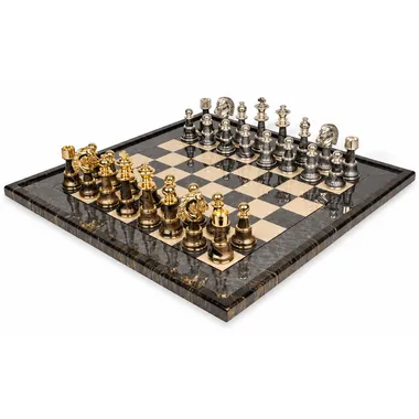Complete chess set viewed from the front with wooden board and gold and silver pieces