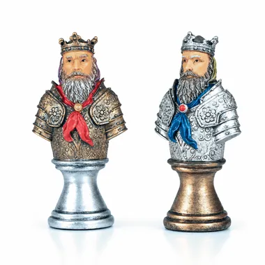 Medieval Bust II chess set on black and gold chessboard, full view