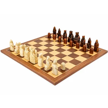 Complete Isle of Lewis chess set on walnut and maple chess board