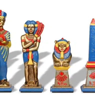Egypt chess pieces in painted metal, blue and gold team with sphinx and obelisk