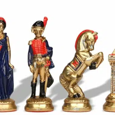 Napoleon Waterloo chess pieces in blue and gold tones, close-up view