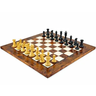 Complete chess set arranged for play on the elm and briar wood chess board